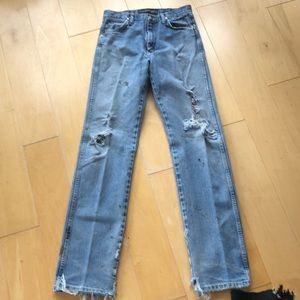 Wrangler jeans! Worn with the holes.